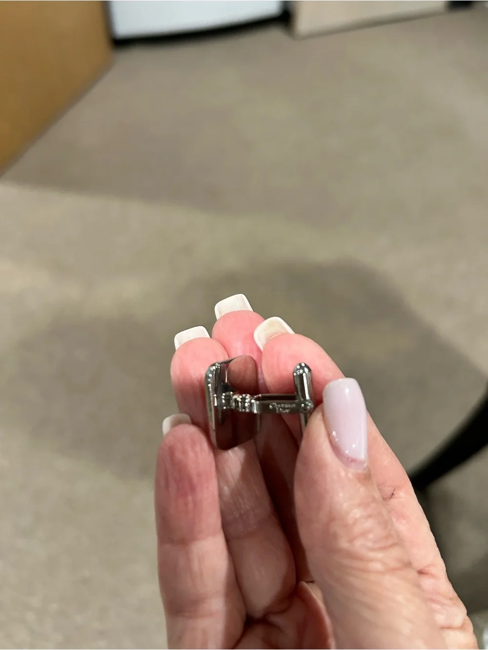 7070. Vintage Dior two-tone cufflinks with engraved Dior hallmark.